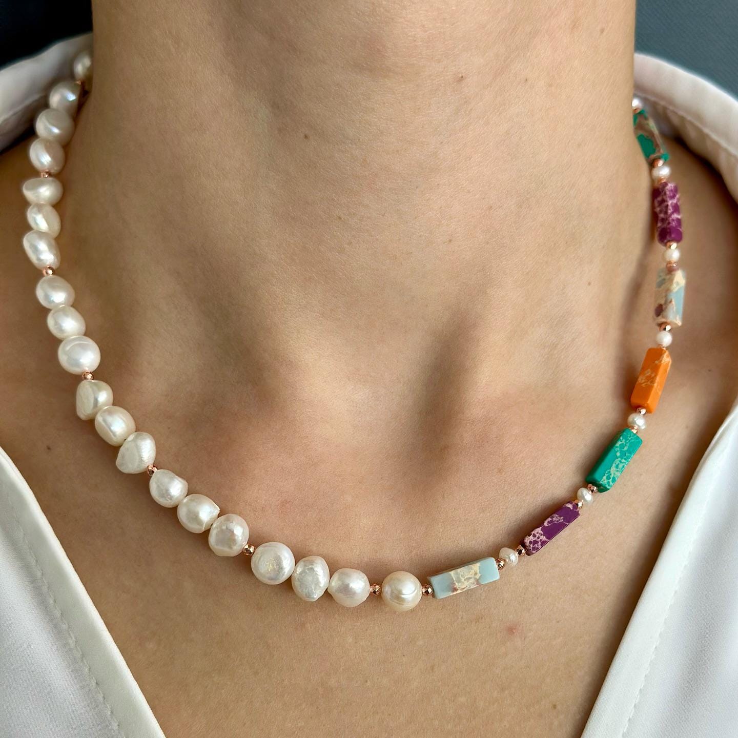Photo showcasing the Liza Necklace featuring variscite, hematite, and pearls with rose gold-plated silver accents.