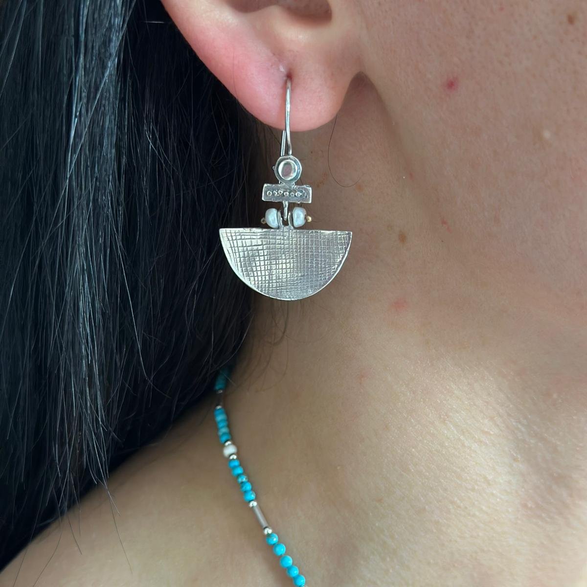 Selena Turquoise Necklace and Earrings Set with silver half-moon earrings and turquoise bead necklace.